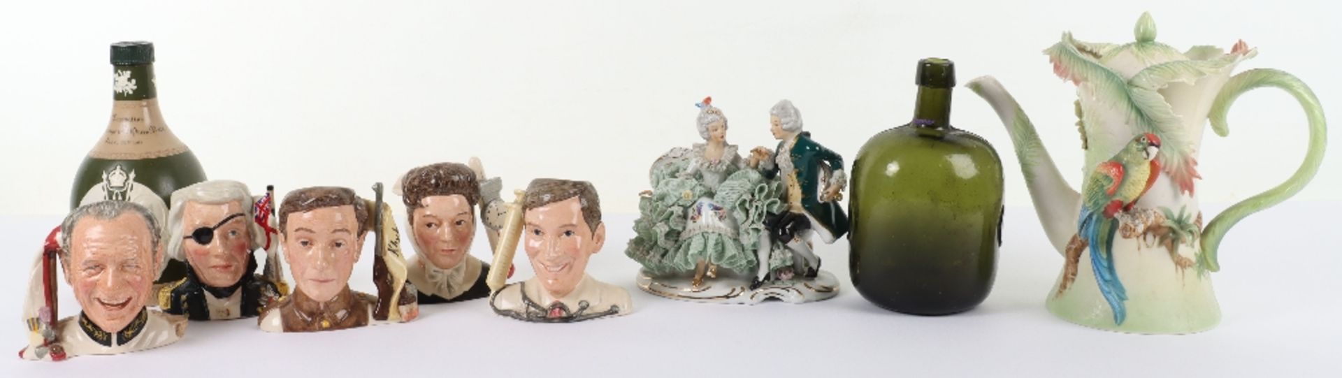 Four Royal Doulton Carry On figures