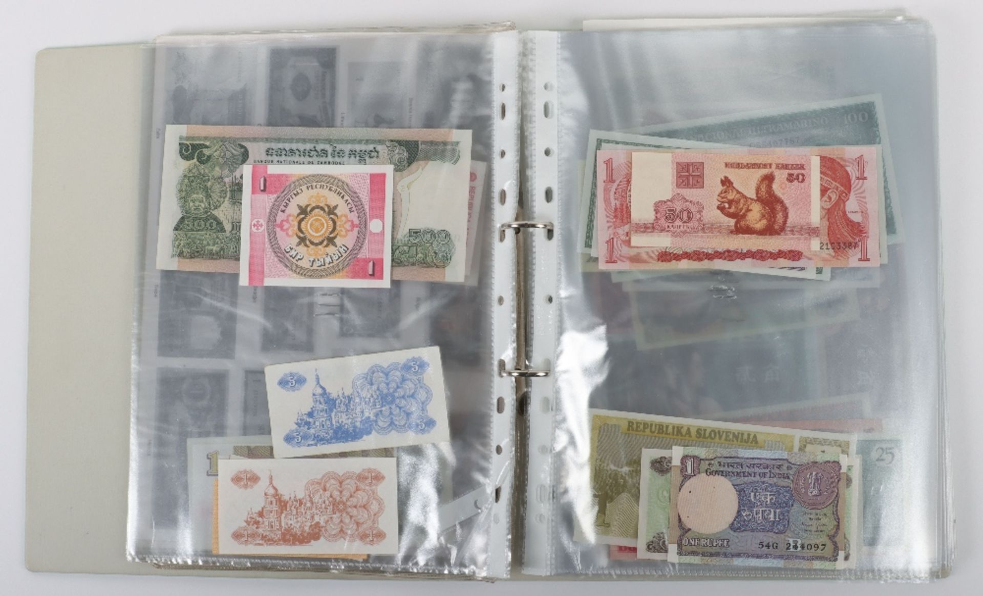 A folder of banknotes, including Canal & Banking Co New Orleans Five Dollar 1860’s, British Armed Fo - Image 7 of 35