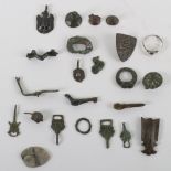 Saxon and later antiquities, including a Saxon disc brooch, Roman/Saxon pheasant bird brooch