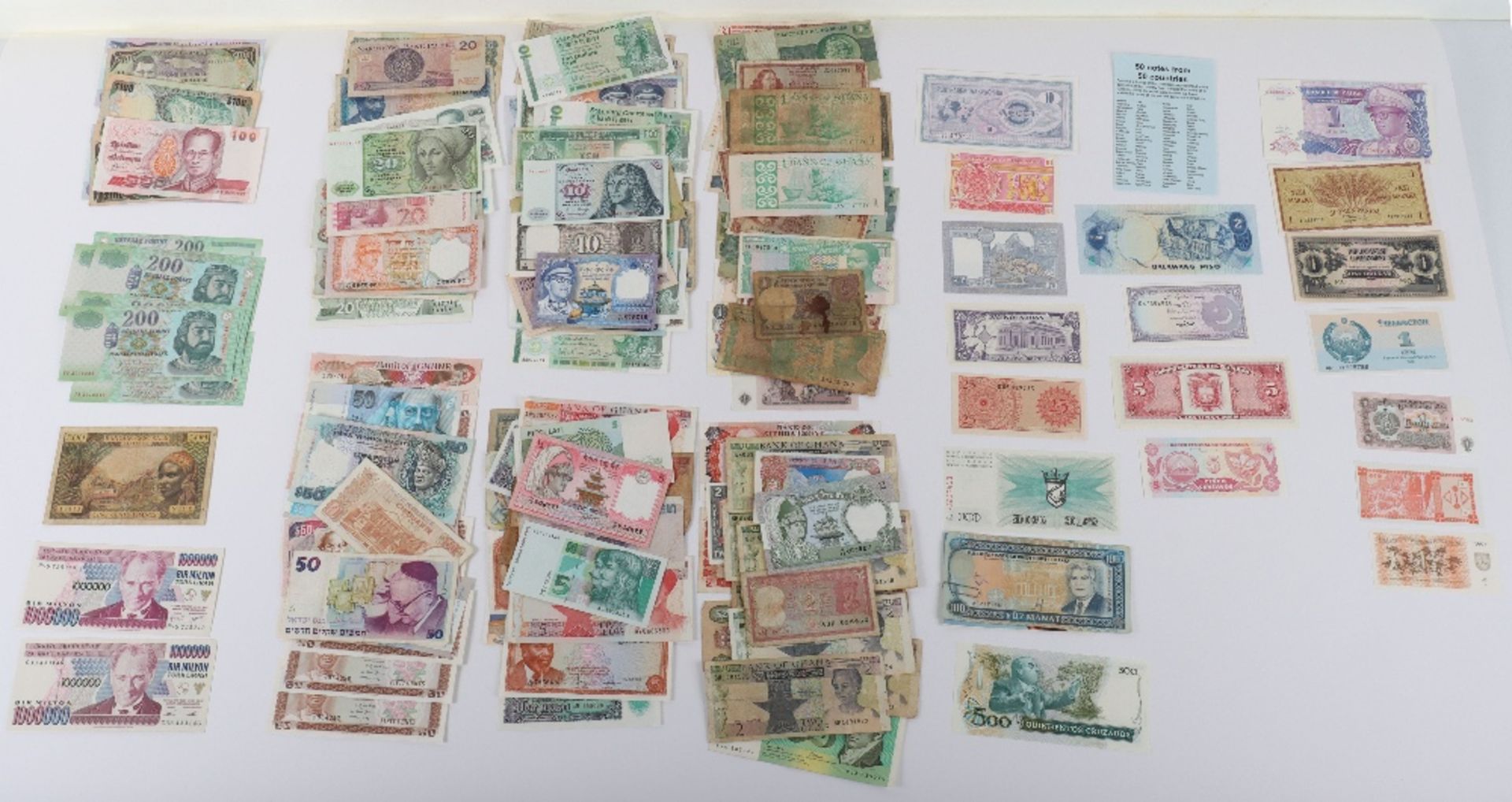 Large selection of world banknotes, Jamaica, Sierra Leone, Colombia, Australia, Brasil, Ghana, etc