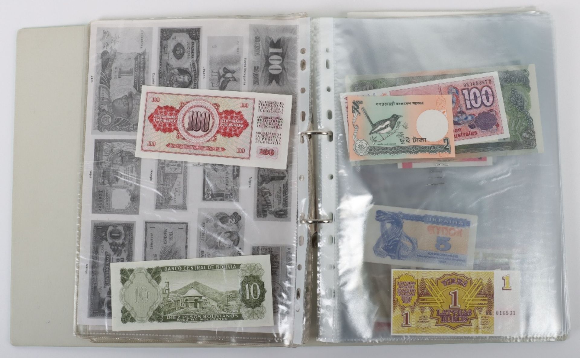 A folder of banknotes, including Canal & Banking Co New Orleans Five Dollar 1860’s, British Armed Fo - Image 2 of 35