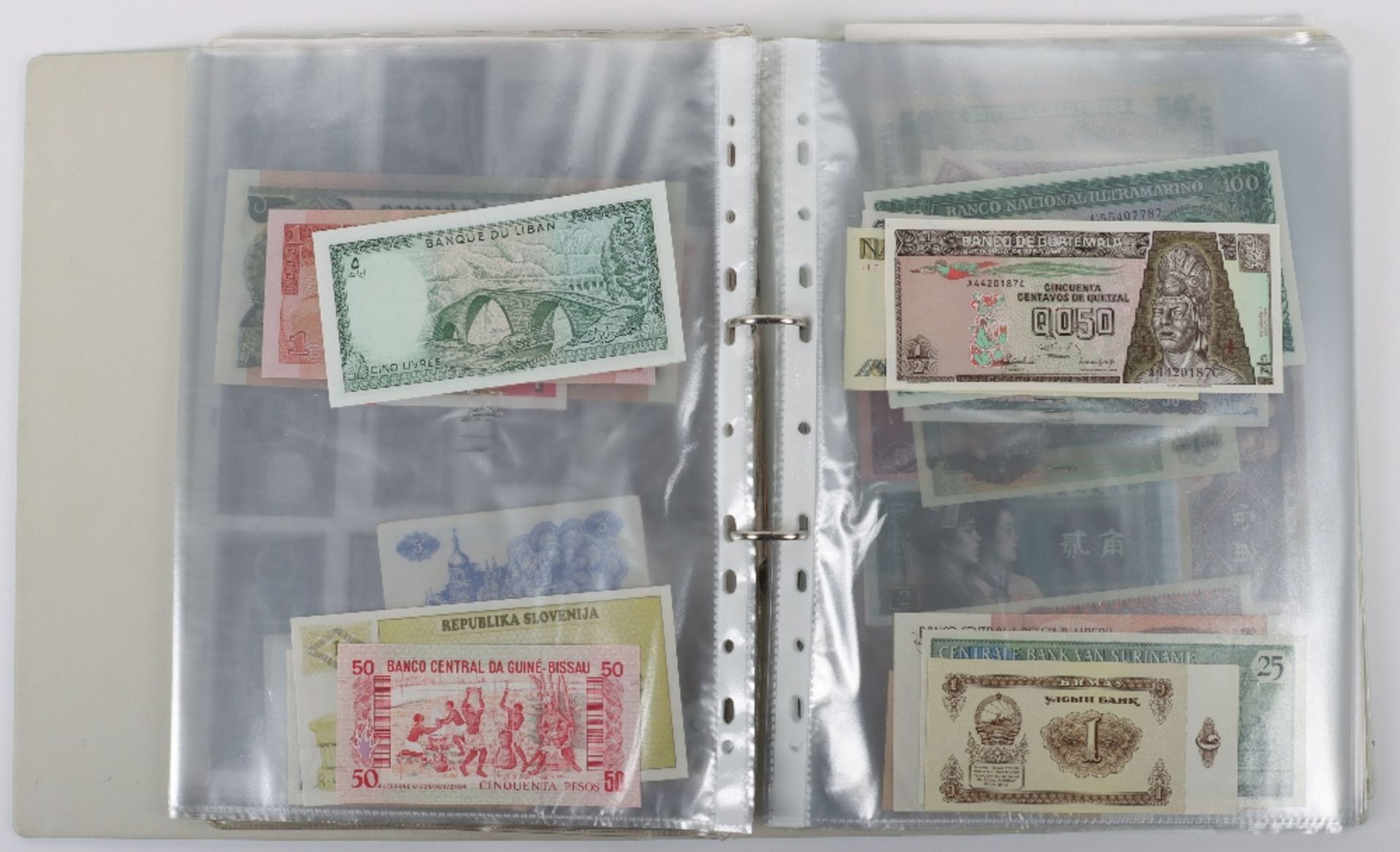 A folder of banknotes, including Canal & Banking Co New Orleans Five Dollar 1860’s, British Armed Fo - Image 11 of 35