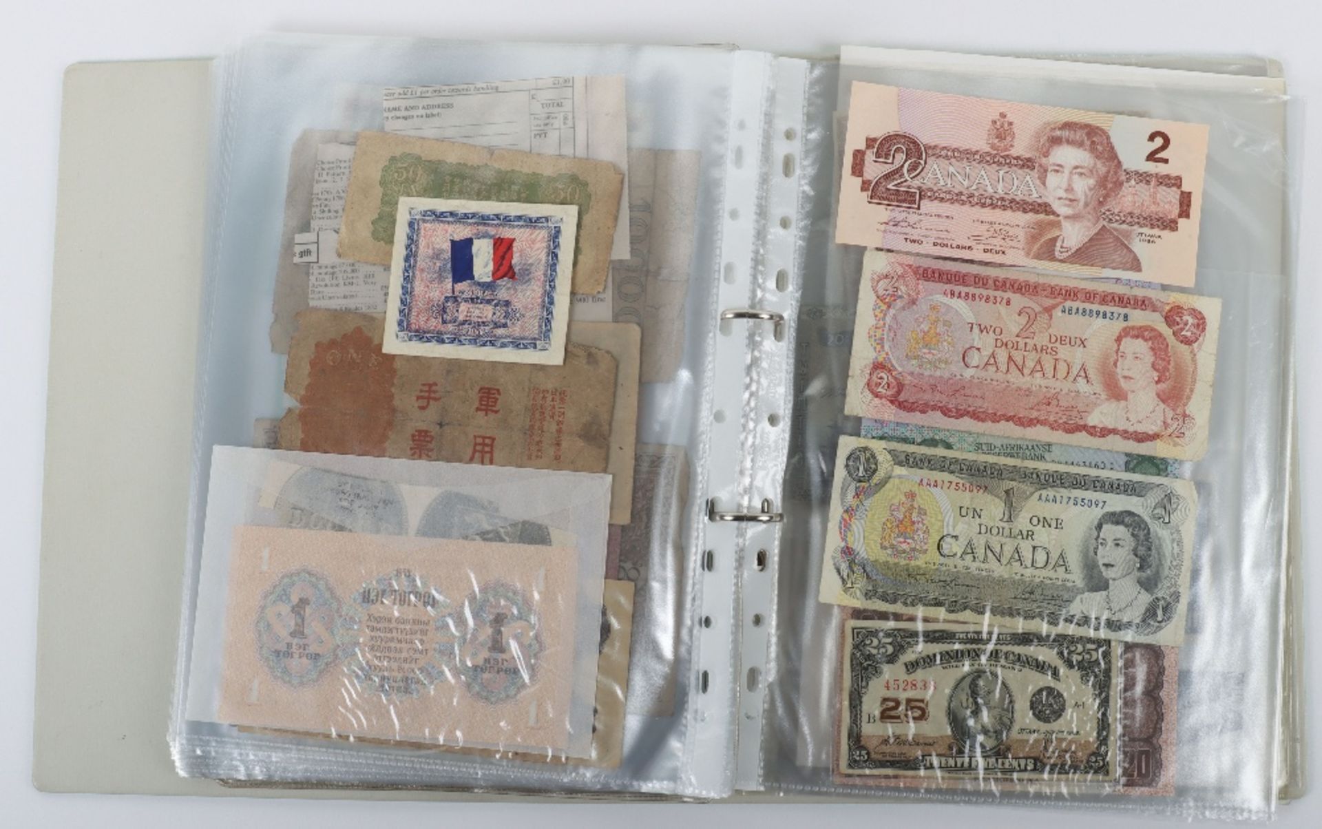 A folder of banknotes, including Canal & Banking Co New Orleans Five Dollar 1860’s, British Armed Fo - Image 30 of 35