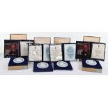 Wedgwood blue and white Jasper portrait medallions, two Churchill and two Queen Mother