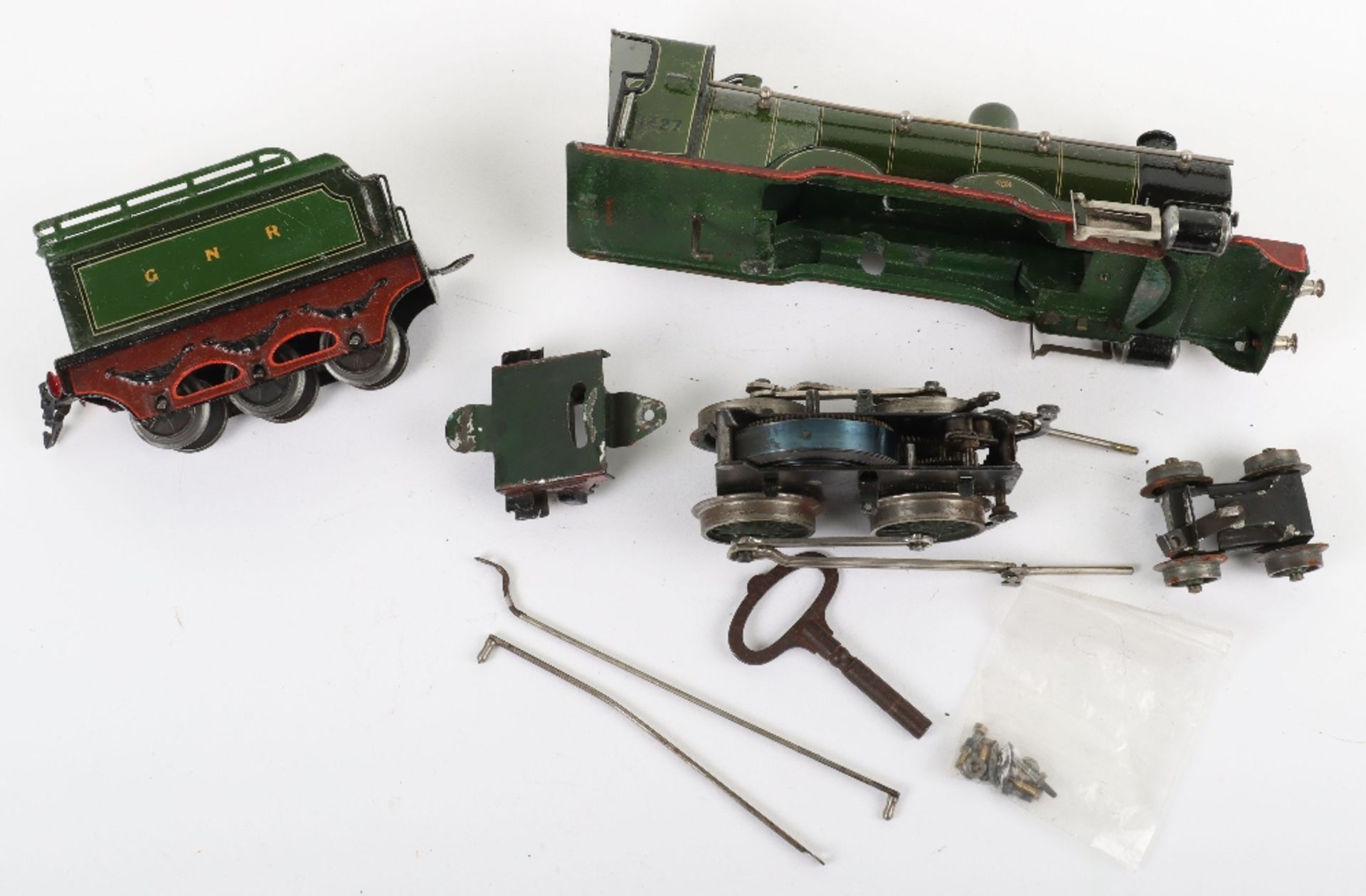 A Marklin 0 gauge clockwork 4-4-2 GNR locomotive and tender - Bild 3 aus 3