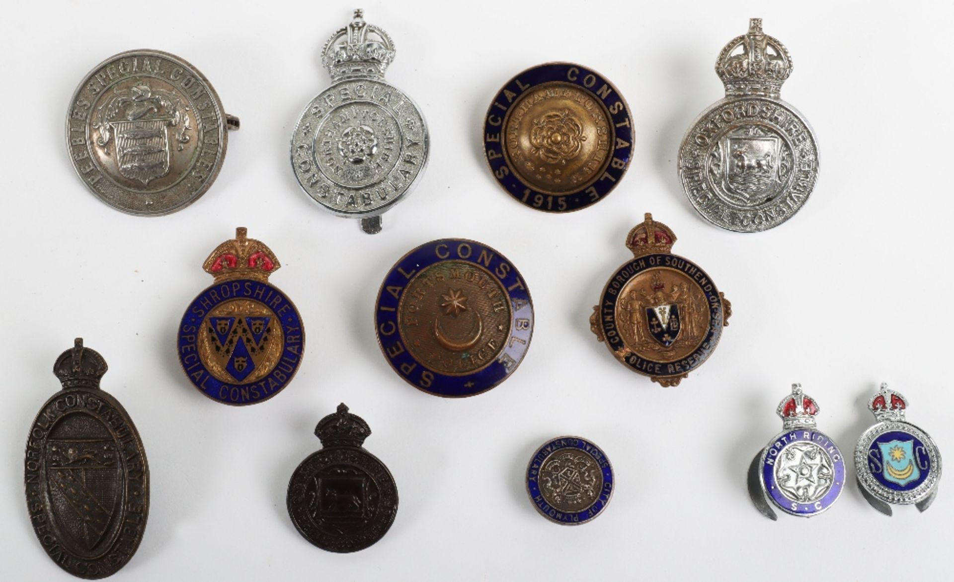 Twelve Special Constabulary Badges