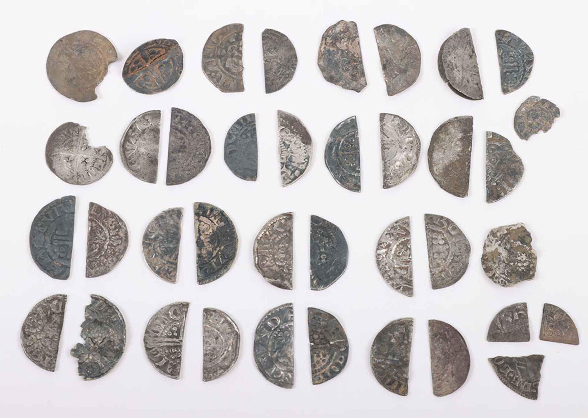 A large selection of hammered cut and fragment pennies and halfpennies