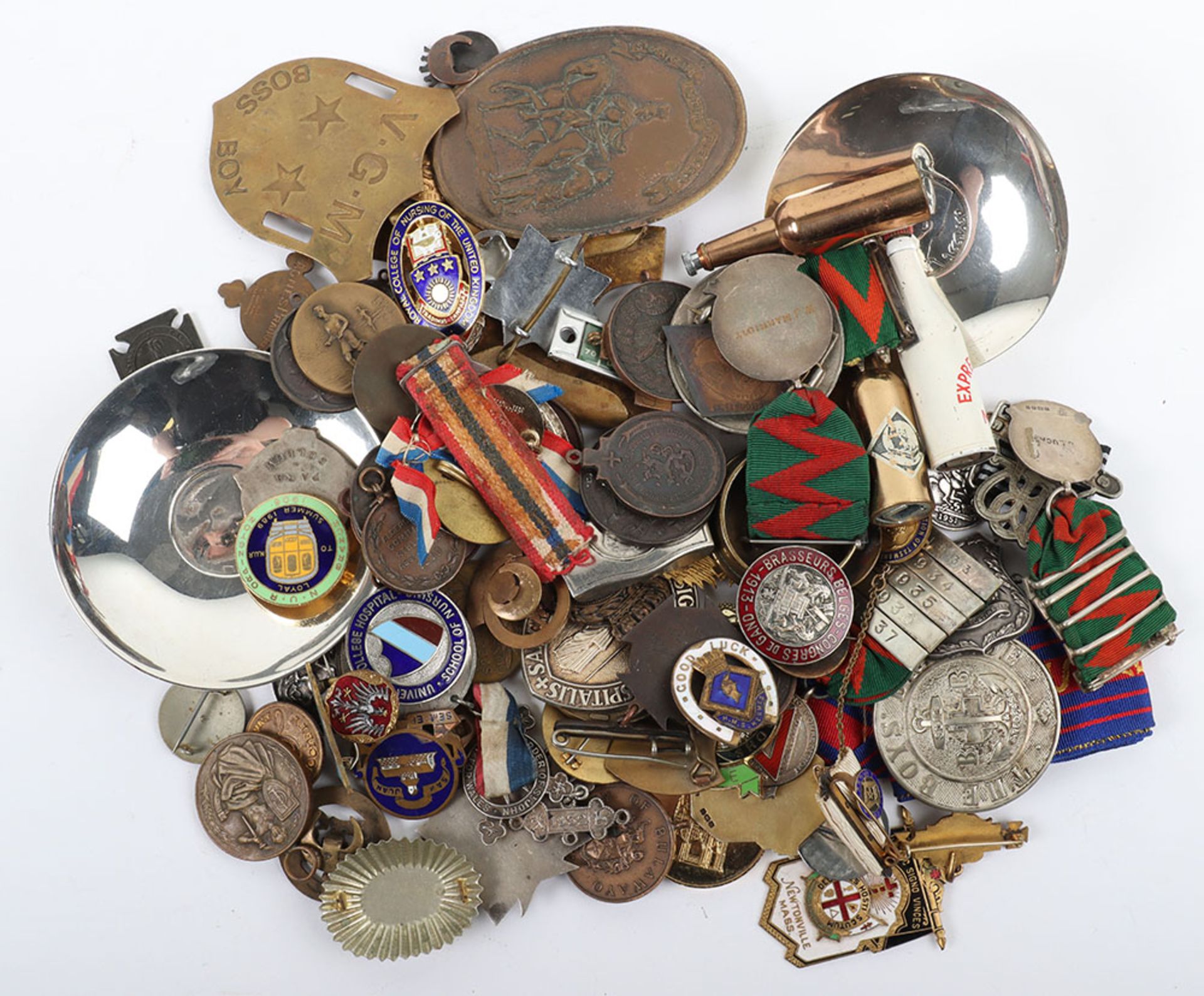 A selection of badges and medals for various awards and services
