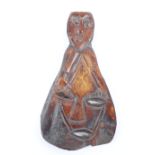 A West African carved wood Makonde style spoon