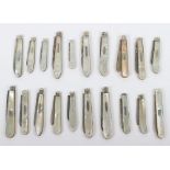 Twenty Victorian silver and mother of pearl folding fruit knives