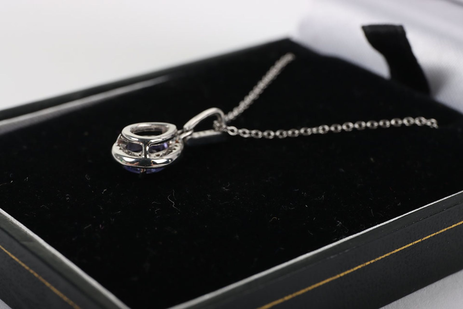 An 18ct white gold diamond and tanzanite pendant necklace - Image 3 of 4