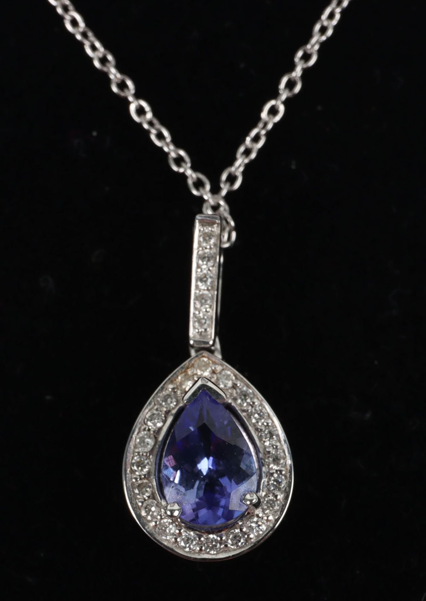 An 18ct white gold diamond and tanzanite pendant necklace