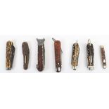 A selection of early antler horn folding knives and combination knives