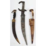 Three Eastern daggers