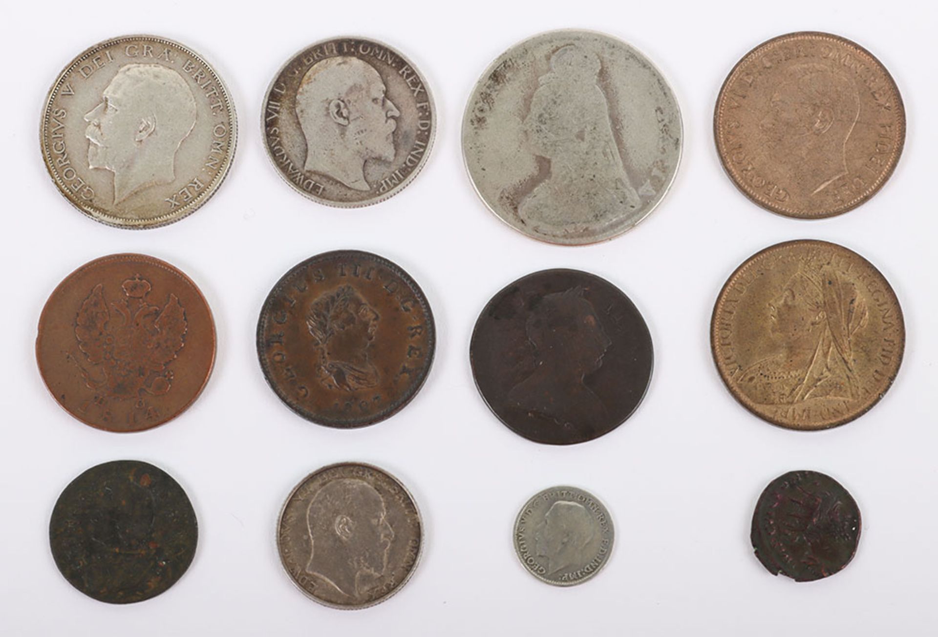 A selection of coins including 1902 Shilling, 1906 Florin, 1807 Halfpenny