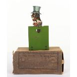 A boxed ‘Jolly Sambo’ (sic) tinplate clockwork novelty toy, German 1920s