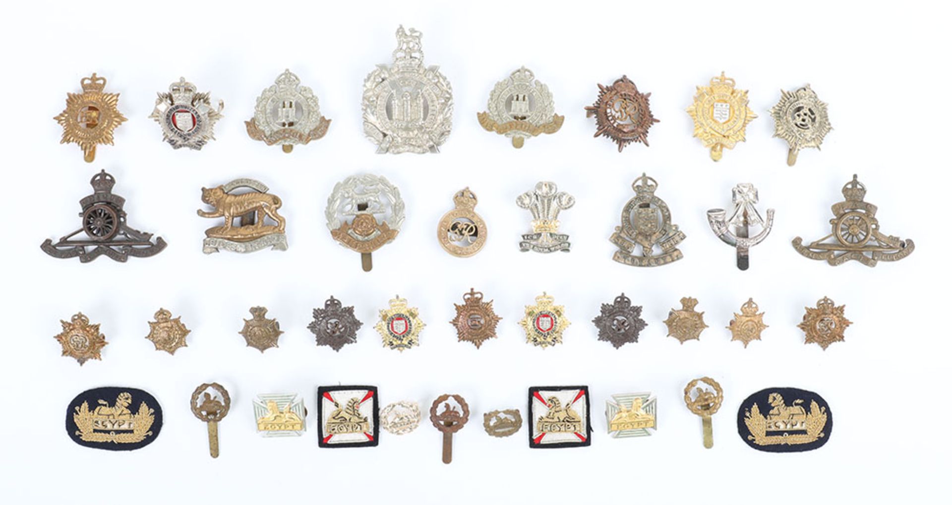 Grouping of Various British Army Cap Badges