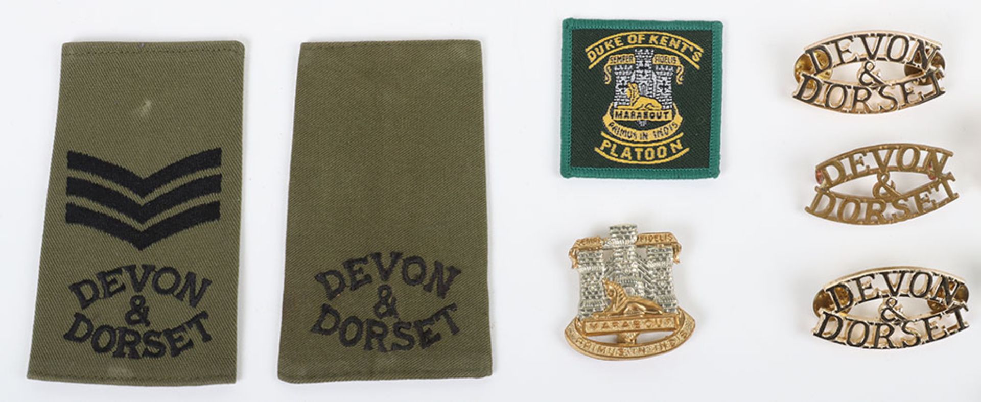 Grouping of Devon & Dorsetshire Regiment Badges, - Image 4 of 6