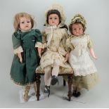 Three bisque shoulder head dolls, English 1915-20,