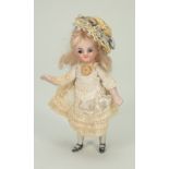 A good miniature all-bisque doll, German circa 1900,