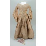 Pink silk gown for large early doll, circa 1850,