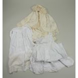 Thirteen long white cotton baby nightgowns, mostly 19th century,