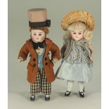 Pair of all original all-bisque dolls, German circa 1910,