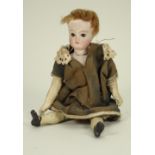 Miniature bisque head doll, circa 1890,