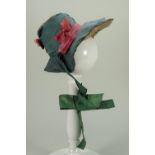 A good and early dolls poke bonnet, circa 1810,
