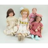 Four bisque shoulder head dolls, English 1915-20,