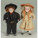 Pair of all original all-bisque dolls, German circa 1910