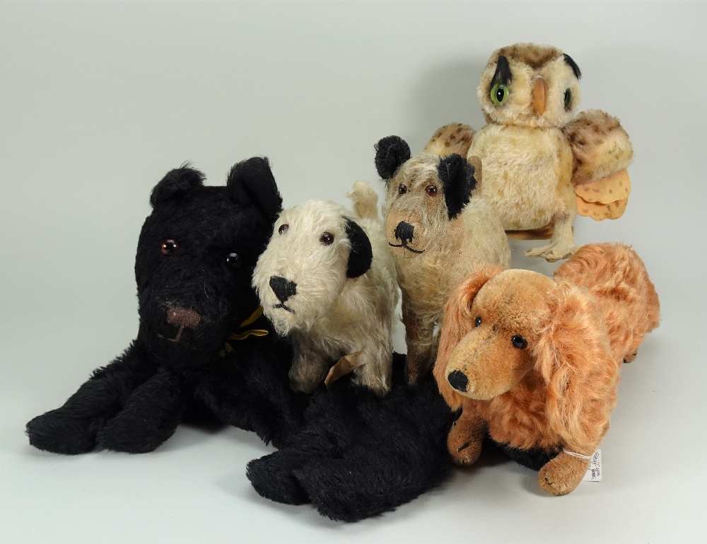 Four soft toy dogs, 1930s/50s,