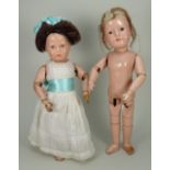 Pair of Schoenhut wooden dolls, American 1920’s,