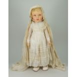 A Raynal felt headed doll, French circa 1930,