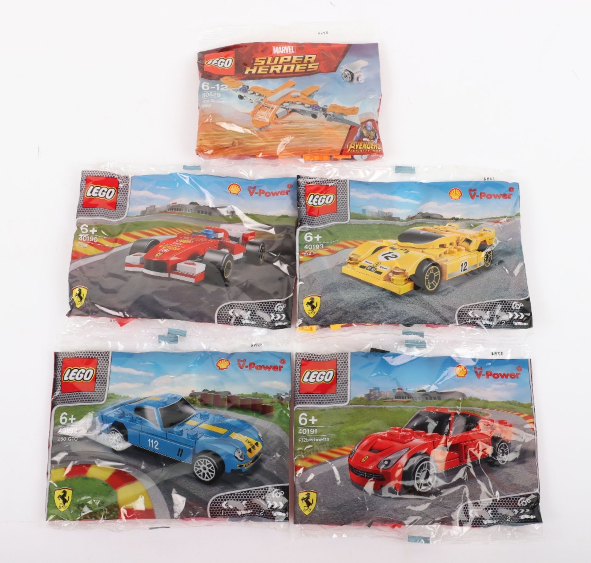 Five Lego sealed Polybags