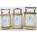 Three Henley brass carriage clock's