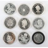 Nine silver coins including 1993 Alderney Two Pounds, 1993 20 Dollars, 3xRepublic of Liberia 10 Doll