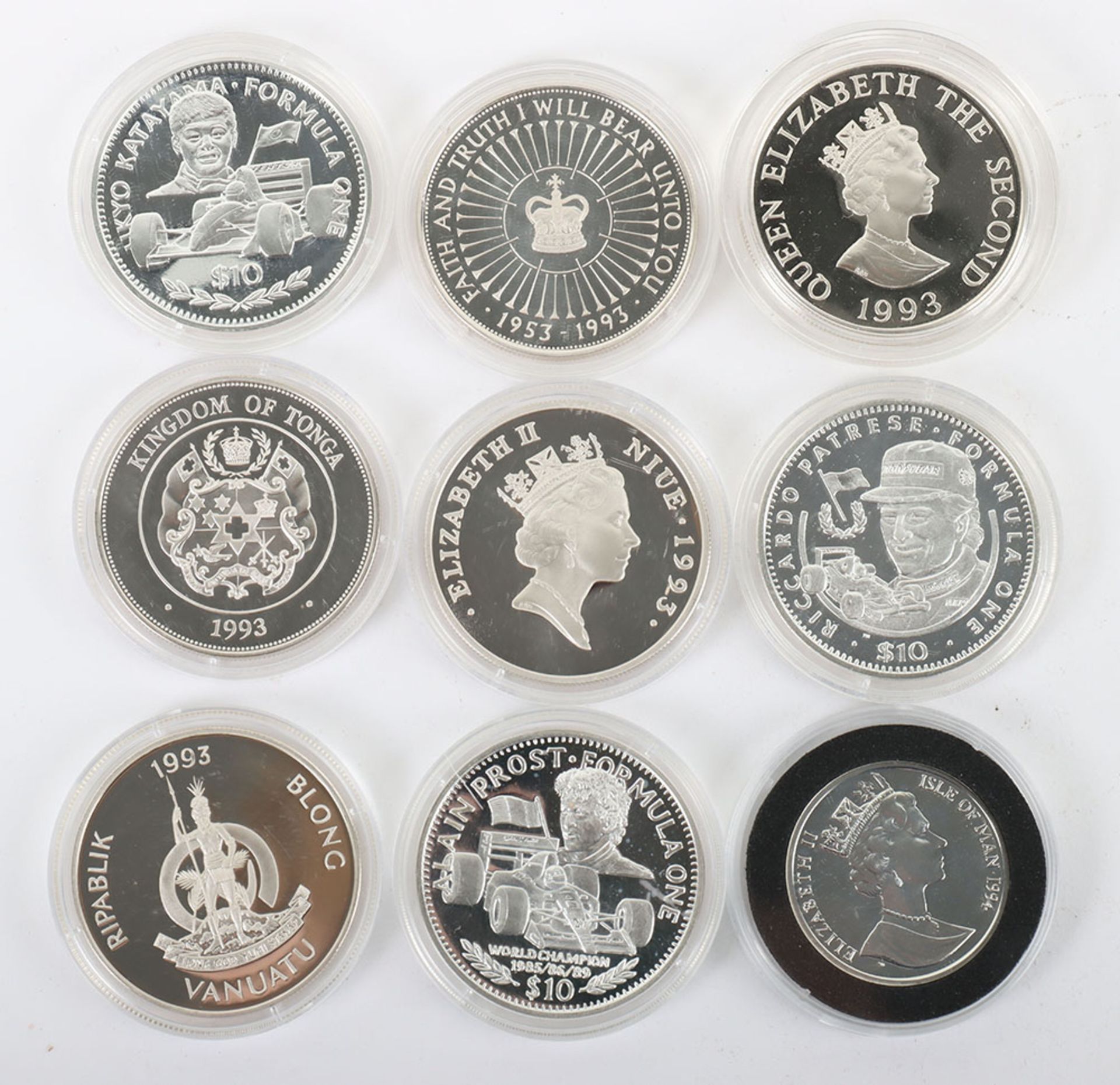 Nine silver coins including 1993 Alderney Two Pounds, 1993 20 Dollars, 3xRepublic of Liberia 10 Doll