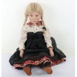 A German Gotz doll no. 24 of 500 of a girl with plaited hair