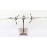 A chromed model of a Mosquito plane on plinth