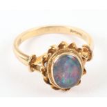 A 9ct gold black opal ring