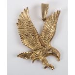 A 20th century 9ct gold eagle pendant