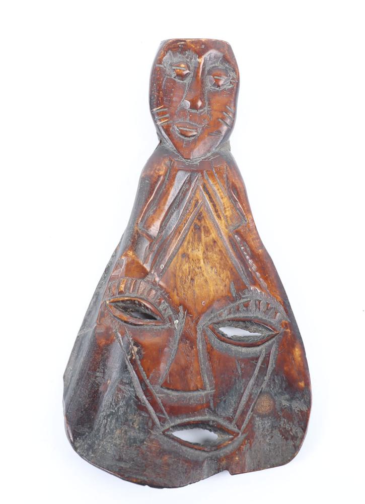 A West African carved wood Makonde style spoon