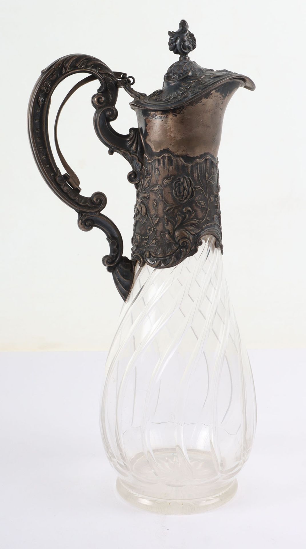 A German silver and glass claret jug