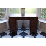 A Georgian style mahogany kneehole desk