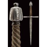 An engraved and silver-inlaid left hand dagger
