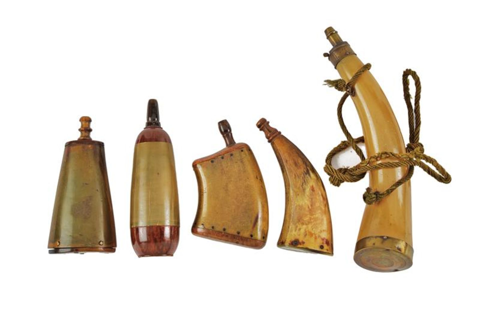 A small collection of five powder flasks in cow horn