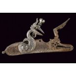 A signed and carved flintlock