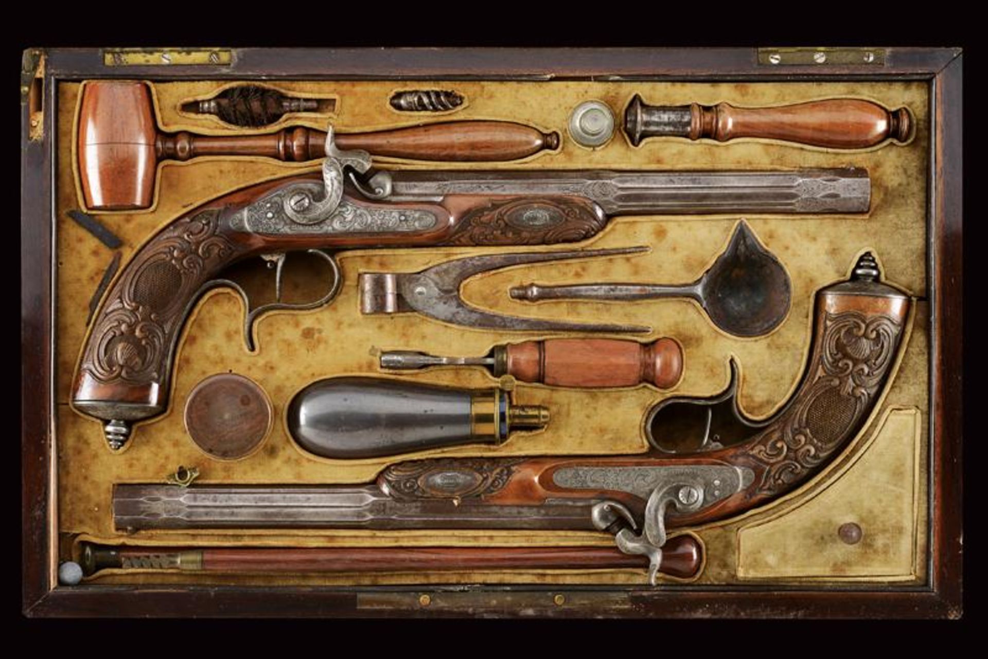 A pair of cased percussion pistols