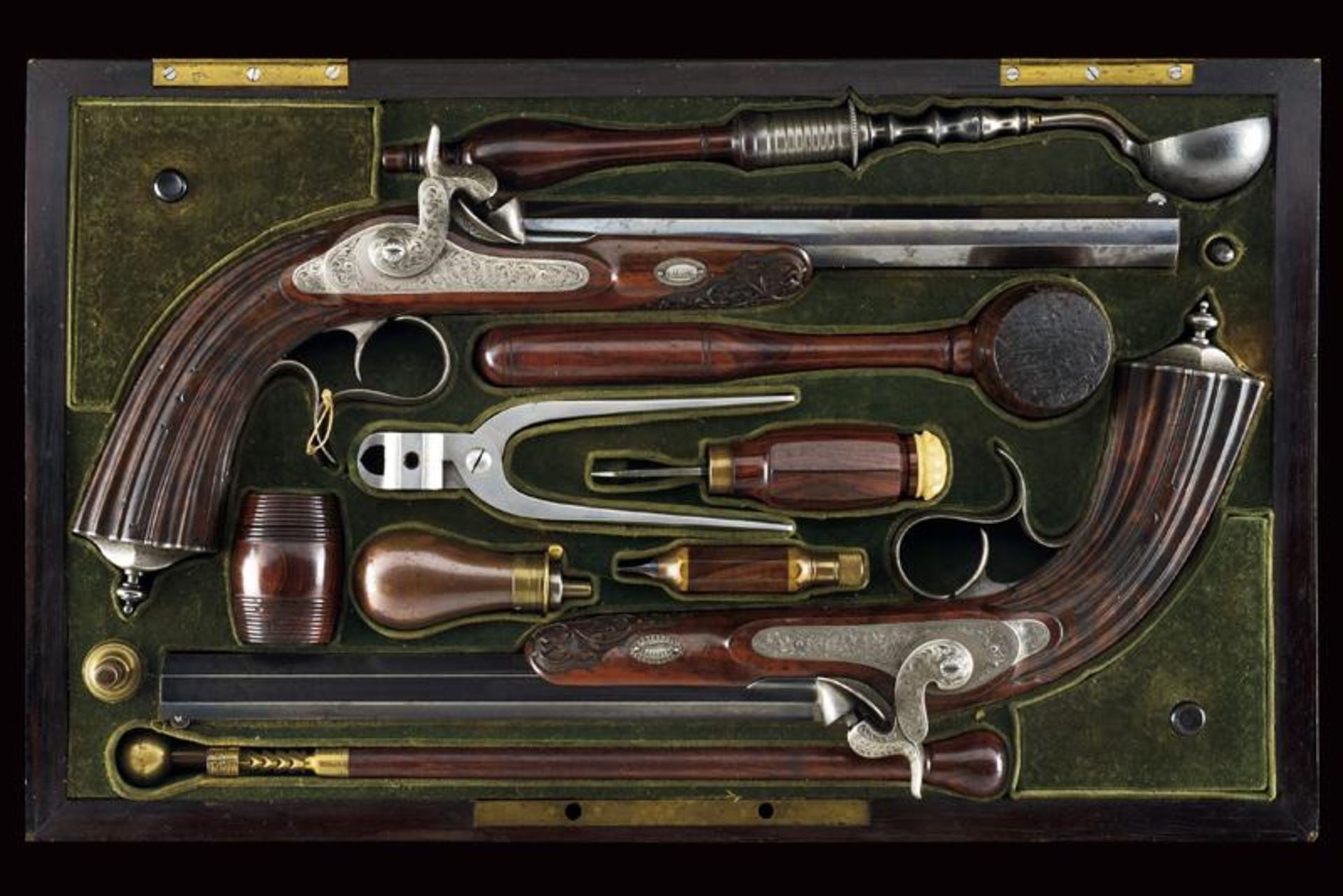 A pair of fine cased percussion pistols marked 'DDB'